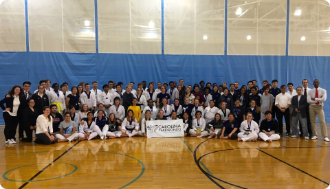 A group photo of participants and volunteers after an ACATA tournament.