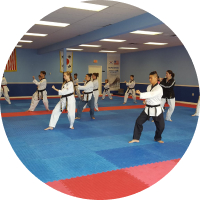 A picture of athletes doing Taekwondo.